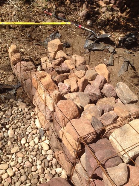 Filling the Baskets With Rocks Diy Gabion, Gabion Wall Design, Rock Fence, Diy Retaining Wall, Gabion Cages, Gabion Retaining Wall, Diy Backyard Fence, Diy Privacy Fence, Gabion Fence