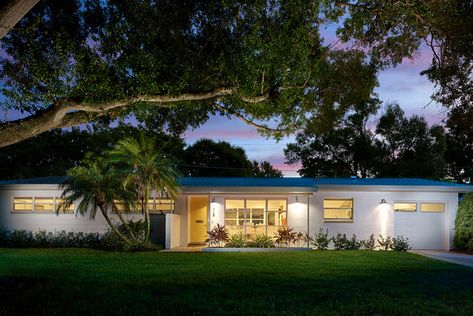 A ranch house in Tampa finds new life with a brighter and more open layout enlivened with pops of orange and wood Midcentury House Exterior, Midcentury Modern Exterior, Midcentury Exterior, Mid Century Ranch House, Mid Century Modern Renovation, Ranch Home Remodel, Ranch Makeover, Mid Century Modern Ranch, Florida Decor