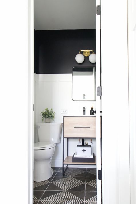 Bathroom makeover with white and black acents Black White Powder Room, Black Half Bathroom, Painted Bathroom Tile, Black And White Powder Room, Art Decor Bathroom, Half Wall Bathroom, White Powder Room, Renovating Kitchen, Bathroom Bright