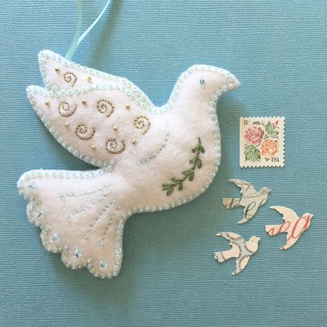 Hand-embroidered dove ornament, embellished with sequins, glass seed beads, and Swarovski Crystal beads. Bird Decorations, Fabric Bird Ornaments, Felt Dove Pattern, Dove Ornaments Free Pattern, Felt Dove, Dove Ornaments Diy, Diy Dove Ornament, Dove Ornament Pattern, Hand Embroidered Dove