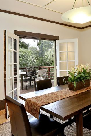 French doors and hardwood floors are features of the formal dining room. Photo: Liz Rusby Dining Room With French Doors To Patio, Dining Room With French Doors, Dining Room French Doors, Room Division, Room With French Doors, Dinig Room, Dining Room Glam, Tiny Dining Rooms, Berkeley Homes