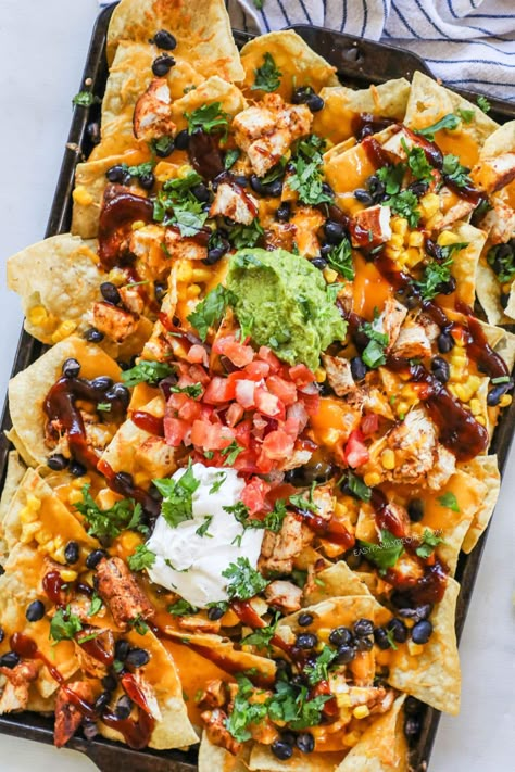 Sheet Pan Bbq Chicken Nachos, Easy Bbq For A Crowd, Barbecue Chicken Nachos, Bbq Chicken Nachos Recipe, Chicken Black Beans Corn, Bbq Nachos, Chicken Leftovers, Mexican Cookbook, Bbq Chicken Nachos