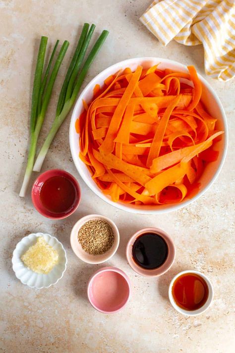 This refreshing raw carrot salad with soy sesame dressing comes together so quickly and easily with a handful of ingredients. Crisp-tender carrots tossed with green onions, sesame seeds, and a flavorful homemade dressing, this is the perfect spring or summer salad! Raw Carrot Salad, Purple Cabbage Slaw, Almond Crusted Salmon, Airfryer Breakfast, Baked Chicken Cutlets, Grilled Buffalo Chicken, Crispy Oven Baked Chicken, Sesame Dressing, Raw Carrots