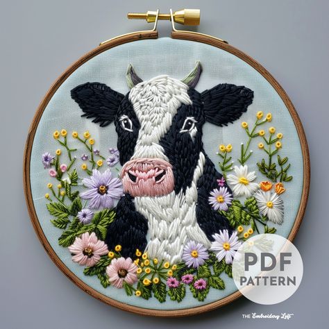 DESCRIPTION Bring the charm of the farm into your home with this delightful cow and flowers hand embroidery pattern! Perfect for animal lovers and embroidery enthusiasts, this pattern features a sweet cow surrounded by blooming flowers, creating a peaceful and picturesque scene. Grab your hoop, needle, and thread, and let's stitch up some farmyard magic! Happy stitching! This listing is for a digital PDF pattern, which includes: ~ Printable pattern scaled to fit 3" to 8" hoops ~ DMC color and st Farm Embroidery Patterns, Cow Hand Embroidery, Embroidery Patterns Flowers, Cow Embroidery, Flowers Hand Embroidery, Farm Embroidery, Embroidery Animals, Sweet Cow, Animals Embroidery