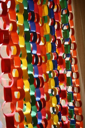 Hanging paper chains can look great. Add colour to a plain background, match in with the colourscheme, be a cheap option for decoration.... Diy Sesame Street Decorations, Sesame Street Birthday Party Ideas Boy, Sesame Street Birthday Party Ideas, Elmo Birthday Party, Sesame Street Birthday Party, Elmo Party, Sesame Street Party, Elmo Birthday, Sesame Street Birthday