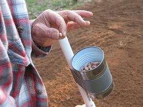 Planting beans and corn by hand is a pain.   It involves a lot of stoop labor and crawling around on the ground.   I don’t plant enough... Planting Beans, Hand Planters, Seed Planter, Beans And Corn, Garlic Seeds, Small Vegetable Gardens, Wooden Plugs, Corn Seed, Planting Tools