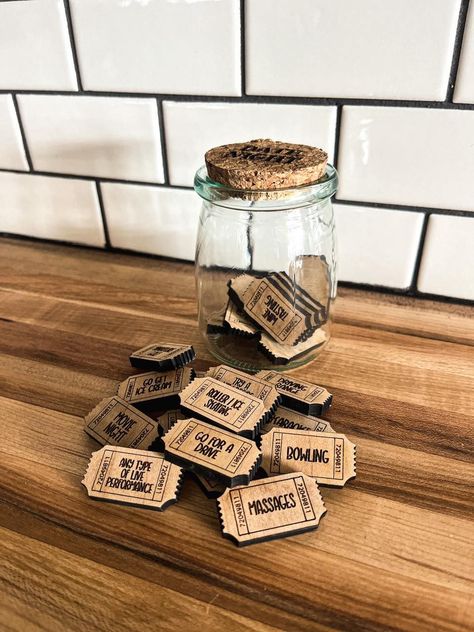 Never struggle to decide what to do for a date night again! Details: Jar is 3.5" tall and 2.5" wide with a cork top Includes 25 date night ideas including one "His Choice" and one "Her Choice" Examples of some of the activities Happy Hour Shoot Pool Watch the Sunset🌐#LoveStory #RomanticEncounters #HeartfeltConnections #DateNightIdeas #SoulmateSearch #FlirtyFridays #CandlelitDinners #StarryEyedMoments #LoveQuotes #DreamyDates #WhisperedPromises #AmourAdventures Jar Of Dates, Sports Medal Display, Date Jar, Date Night Jar, Kids Growth Chart, Christmas Stocking Ornament, Teacher Gift Card, Tiered Tray Diy, Watch The Sunset