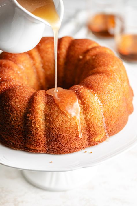 Treat yourself to this easy rum cake recipe that’s packed with flavor and so simple to make! Rum Cake Using Box Cake, Rum Cake With Rum Extract, Rum Cake Glaze, Rum Cake Glaze Recipe, Rum Raisin Cake, Orange Rum Cake Recipe, Cake Mix Rum Cake, Rum Cake From Box Cake, Moist Rum Cake