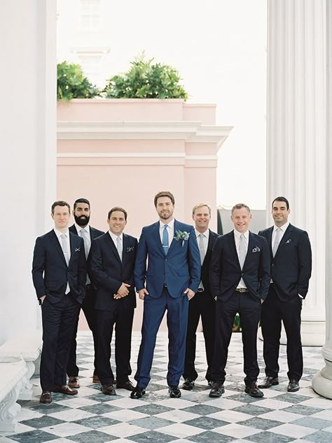 Groom In Blue Groomsmen In Black, Blue Groom Suit Black Groomsmen, Bestman Suit Groomsmen, Black And Blue Suits For Men, Navy Blue Suit Groom, Male Bridesmaid, Black Groomsmen Suits, Navy Groomsmen Suits, Groomsmen Black