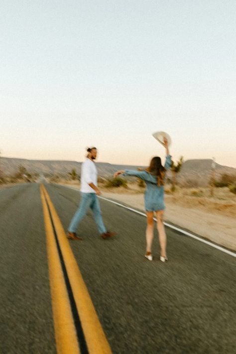 Couple dancing in the middle of the road in the desert Joshua Tree Engagement Photographer Maternity Shoot Makeup, Cowboy Tub, Knot Photography, Western Elopement, Joshua Tree Engagement Photos, Engagement Photo Shoot Ideas, Desert Engagement Photos, Couple Getting Married, Elopement Styled Shoot