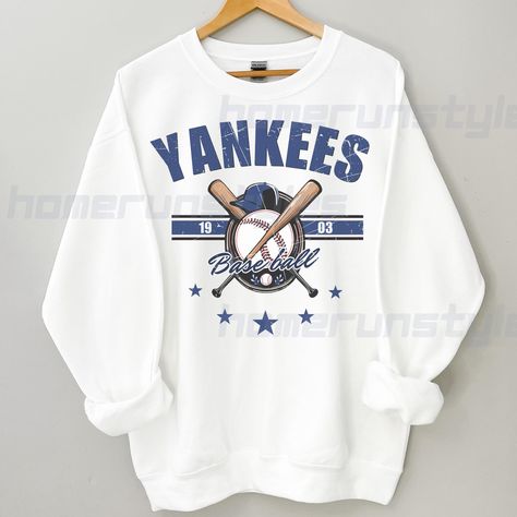 Unite in Pinstripe Pride! ⚾✨  Represent the legendary New York Yankees with this MLB fan apparel. Whether you're at the game, enjoying baseball season, or looking for the perfect Yankees fan gift, this vintage graphic tee or New York sweater is designed for men, women, and kids who love NY baseball. 🏆💙 ---MATERIAL--- * 50% cotton, 50% polyester 🧵 * Pre-shrunk 🔄 * Classic fit 👕 * 1x1 athletic rib knit collar with spandex 💪 * Air-jet spun yarn with a soft feel ✨ * Double-needle stitched collar, shoulders, armholes, cuffs, and hem 🪡 ----HOW TO ORDER---- - Check and review all photos 📸. - Select your shirt color 🎨. - Select your shirt size (see sizing chart in product images for reference) 📏. Continue shopping to add more products or complete the checkout process. Proceed to checkout