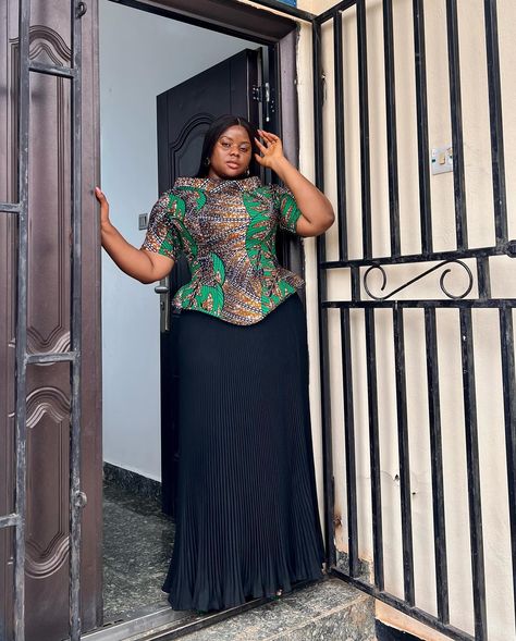 Ankara corset top paired with an accordion long black skirt Both pieces can be shopped individually on @kawandoortw Outfit @kawandoortw Shoes @deeswoman.ng #wandoomadeit Ankara Corset Top, Ankara Corset, Long Black, Black Skirt, Corset Top, Ankara, Black