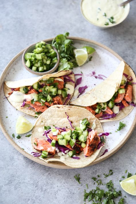 This salmon tacos recipe is one of my favorite easy fish dinners. It's served on #glutenfree corn tortillas, topped with cucumber salsa and spicy jalapeno aioli! ♡ #healthy #easydinners #recipes #tacos #salmon #healthydinner #fast #quick #fishtacos | www.feedmephoebe.com Blackened Salmon Tacos, Jalapeno Aioli, Gluten Free Corn Tortillas, Salmon Tacos Recipe, Easy Fish Dinners, Fish Dinners, Cucumber Salsa, Salmon Tacos, Diet Dinner Recipes