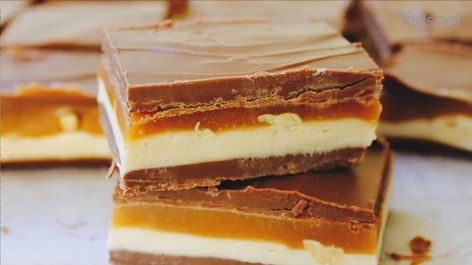 Snickers slice: No-bake recipe | Australia's Best Recipes Gluten Free Icing, Snickers Slice, Muesli Slice, No Bake Slices, Easy Slice, Cake Stall, Chocolate Slice, Australia Food, Slices Recipes