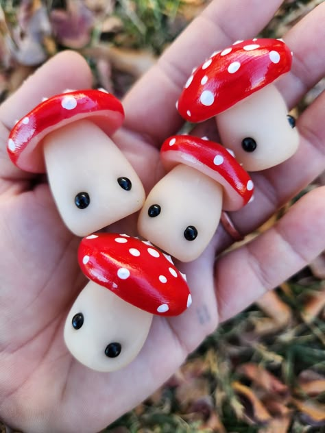 Magical mushroom friends that make the best desk pet, car accessory, or wherever you need a little smile! These friends have little eyes and their tops come in either red or blue with a shimmery top coat.  Mushroom spots will vary and are larger than the first picture.  We are nearly always processing over 100 orders which are all made by hand so please allow 7-9 business days for us to make your new friend. Cute Mushroom Stuff, Cute Mushroom Crafts, Mushroom Clay Art, Mushroom Stuff, Mushroom Polymer Clay, Clay Mushrooms, Mushroom Core, Fimo Kawaii, Cute Mushrooms