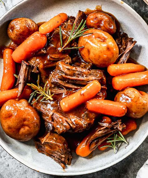 Packed with flavor, hearty veggies, and tender beef, this Instant Pot Pot Roast will quickly become a family favorite! It's easy and quick in the pressure cooker! #wellplatedrecipes #potroast #instantpotpotroast #InstantPotbeefrecipes Instant Pot Roast, Pressure Cooker Pot Roast, Instant Pot Pot Roast, Roasted Potatoes And Carrots, Pot Roast Recipes, Tender Beef, Hearty Dinner, Honey Recipes, Mashed Sweet Potatoes