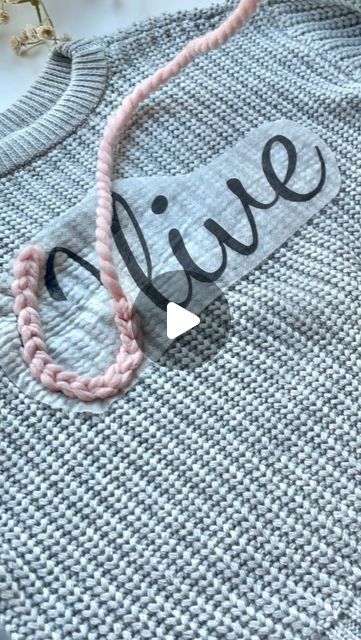 Samantha Bower on Instagram: "Chain Stitch Tutorial🪡🤍  The most commonly used stitch for sweaters. Which do you find easiest?  Comment LEARN for the link to my Sweater Stitch Sampler to learn 8 more beginner stitches!🫶🏼  #embroidery #babysweater #namesweater #diycrafts #handembroidery #embroideredclothing #chainstitch" Thick Chain Stitch Embroidery, Chain Stitch Name Embroidery, Chain Stitch On Knitting, Chain Stitch On Sweater, Chain Stitch Embroidery Sweater, Chain Stitch Name Sweater, Yarn Embroidered Sweater, Chainstitch Font, How To Chain Stitch Embroidery