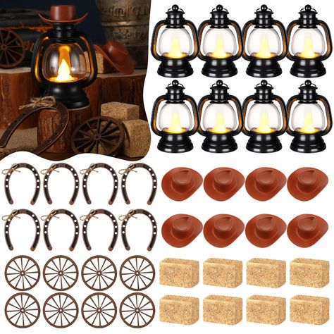 PRICES MAY VARY. Complete Western Themed Party Decorations Set: this collection consists of 60 combined sets of western cowboy theme party decorations; The package offers 12 mini lanterns, 12 mini cowboy hats, 12 mini horseshoes, 12 wagon wheels and 12 hay bales; This inclusive package will meet all your decorative needs, allowing for extra items to be stored for future use Delicate Western Cowboy Theme: our western theme centerpieces are suitable for those with a love for the west and cowboy cu Dollar Tree Cowboy Party, Western Theme Retirement Party, Cowboy Theme Party Centerpieces, Cowboy 1st Birthday Party Centerpieces, Western Christmas Centerpiece Ideas, Montana Themed Party, Stagecoach Birthday Party Ideas, Western Theme Table Centerpieces, Texas Themed Party Decorations