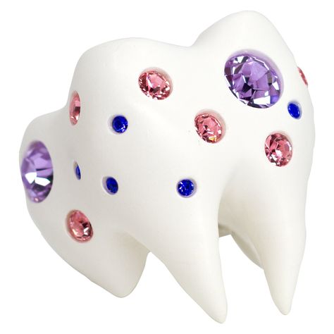 Sugar, spice and everything sparkly. The Sweet Tooth Ring is a lifelike chunky tooth embellished with three different sizes of crystals in violet, pink, and sapphire, each placed individually by hand. This chonky ceramic finished tooth sits on a solid sterling silver band engraved with our signature logo and "you are loved" phrase. Origin story: The Sweet Tooth crawled out of an abandoned candy wrapper found on the street. Toxic trait: Only drinks diet coke. Tooth Ring, Tooth Enamel, Candy Wrapper, Anti Fashion, Dream Aesthetic, Candy Jewelry, Origin Story, Online Closet, Fun Jewelry