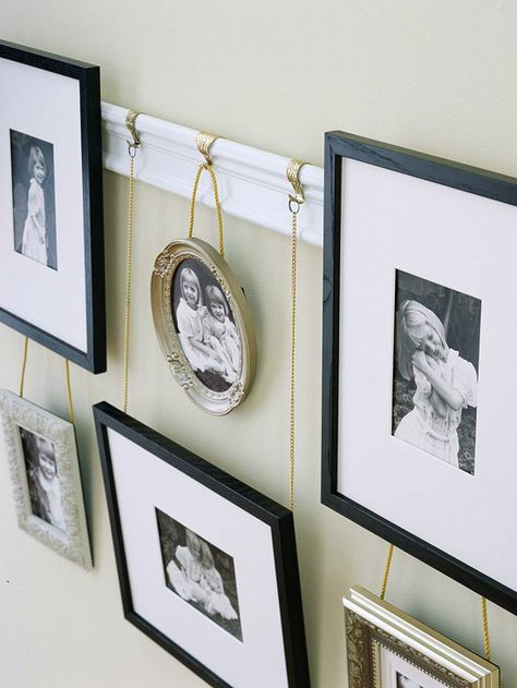 Try hanging your personal pictures in a unique way for a great way to update that blank wall: http://www.bhg.com/decorating/budget-decorating/cheap/low-cost-bedroom-updates/?socsrc=bhgpin011114hangpersonalizedartwork&page=8 Displaying Family Pictures, Photo Album Display, Wal Art, Bedroom Updates, Picture Rail, Picture Hook, Modern Victorian, Personalized Artwork, Picture Hanging