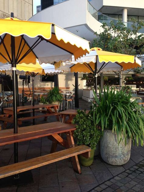 Yellow Patio Umbrella, Outdoor Seating Cafe, Beer Garden Design, Florida Vibes, Outdoor Umbrellas, Festival Ideas, White Umbrella, Yellow Umbrella, Outdoor Dining Spaces