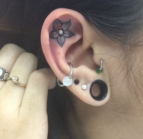 Ear Tattoo With Piercing, Piercings Ear, Ear Tattoo Ideas, Cartilage Tattoo, Inner Ear Tattoo, Tiki Tattoo, Waist Tattoos, Hibiscus Tattoo, Hand And Finger Tattoos