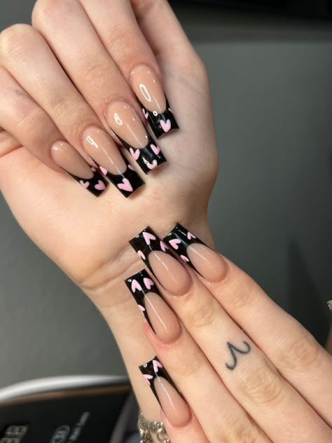 Black French Tip Nails With Pink Hearts, Classy Nail Designs Black, Black French Tips With Pink Hearts, Black French Heart Nails, French Hearts Nails, Long Nails With Hearts, Black French Tip Valentines Nails, Black French Tip Heart Nails, Heart Designs On Nails