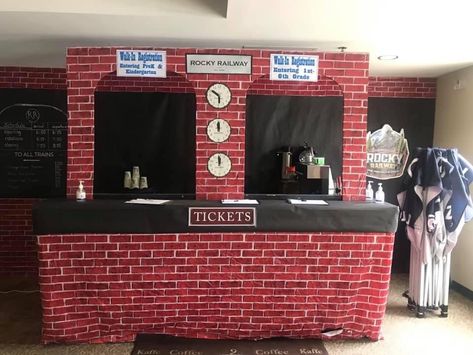 Christmas Train Outdoor Decoration, Diy Train Station Ticket Booth, Train Theme Decorations, Train Station Set Design, Diy Train Station, Train Ticket Booth Diy, Polar Express Balloon Arch, Train Vbs Decorations, Rocky Railway Vbs 2020 Decorations