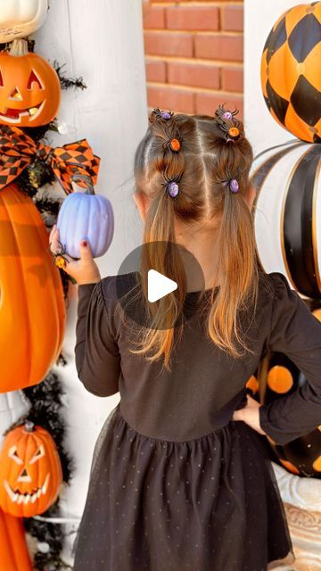 Lauren Vandiver Green on Instagram: "Spooky Spider Halloween Girls’ Hairstyle.🕷️✨ We used the cutest $1.25 plastic jewel spider rings from Dollar Tree for this easy spider bubble braid hairstyle, but you can use any plastic Halloween rings.💜🧡 It’s a simple no-braid braid that anyone can do. All you need are small rubber bands, plastic spider or Halloween rings, a comb to part hair and a clip to separate hair.🕸️ Step by step instructions below for this easy Halloween hair tutorial.

🕷️SPOOKY SPIDER BUBBLE BRAID STEPS:🕷️

1. Part hair down the middle. Secure one side with a clip.
2. Part a 2 inch section of hair at the top of one side and secure with rubber band.
3. Separate another 2 inch section below, add to top section and secure with rubber band.
4. Repeat until all hair in first Spider Ring Hair, Spider Hair Bun, Spider Hairstyle, Easy Halloween Hair, Halloween Hairstyles For Kids, Bubble Braid Hairstyle, Halloween Rings, Spider Rings, Spider Hair