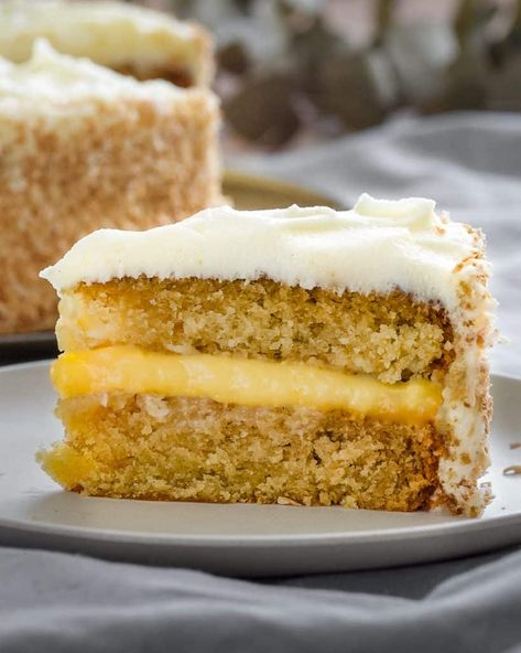 This vegan coconut and lemon cake is a true cake for all seasons! It's perfectly fruity for a light summer dessert and ideal for a bright pick-me-up in the depths of winter! The post Vegan Coconut and Lemon Cake appeared first on School Night Vegan. Coconut Lemon Cake, Lemon Coconut Cake, Light Summer Desserts, Vegan Sweet Treats, Springform Pan Cake, Vegan Easter, Coconut Frosting, Vegan Coconut, Vegan Cake Recipes