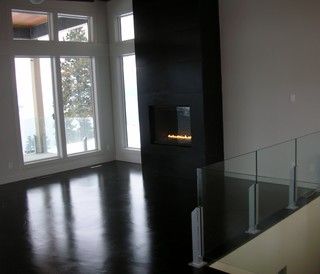 Black Concrete Floors, Black Stained Concrete, Stained Cement Floors, Concrete Floor Ideas, Corner Fireplace Mantels, Corner Fireplace Makeover, Concrete Fireplace Surround, Simple Fireplace, Fake Fireplace