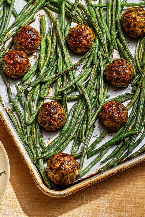 We’re here for sheet-pan dinners that can go in and out of the oven in less than 30 minutes. Enter these turkey meatballs jam-packed with fresh herbs and some chile for a kick of spice. They’re bouncy with a bite, but still juicy and succulent. The meatballs are roasted on a sheet pan with green beans, then quickly finished under the broiler until the beans start to blister and char. These meatballs are equally delicious with ground pork, lamb, or beef. Sheet Pan Meatballs, Beans Recipe, Green Bean Recipes, Turkey Meatballs, Sheet Pan Dinners, Sheet Pan Recipes, Full Meal Recipes, Ground Pork, Bean Recipes