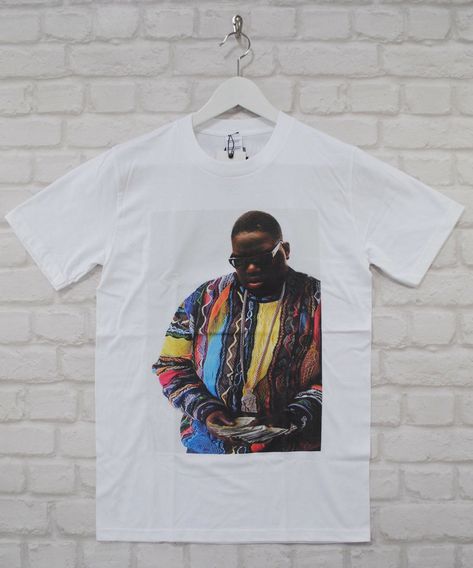 Brand new & tagged genuine Actual Fact tee  featuring hip hop legend Notorious BIG  Super premium quality 100% cotton Tee  Available in size S – XXL Small = 36” chest, Length = 27.5” Medium = 40” chest, Length = 28.5” Large = 42” chest, Length = 29” X-Large = 46” chest, Length = 30.5” XX-Large = 50” chest, Length = 32” Hip Hop Tee, Vintage Hip Hop, Notorious Big, Sleeve Designs, Fashion Tops, Vintage Shirts, Womens Clothing Tops, Cotton Tee, Sleeve Styles