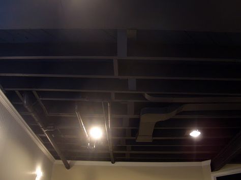 Painting the ceiling black to hide duct work. Nice idea. Black Basement Ceiling, Basement Ceiling Insulation, Basement Ceiling Ideas Cheap, Unfinished Basement Ceiling, Basement Ceiling Painted, Ceiling Tiles Basement, Basement Ceiling Options, Basement Ceiling Ideas, Ceiling Options