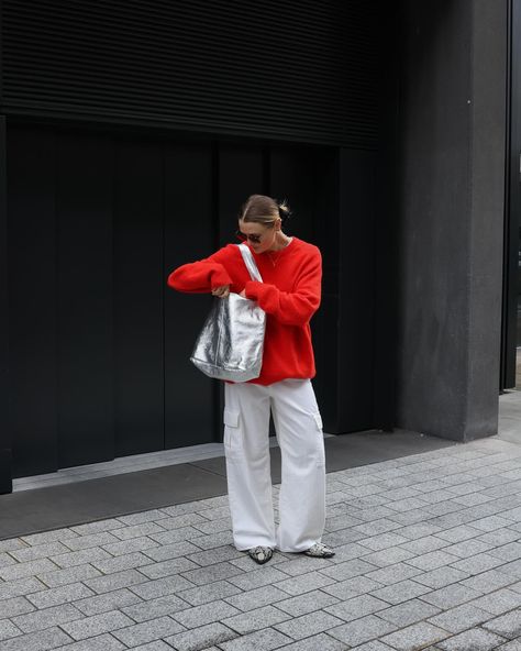 Slightly obsessed with this bag 🥹 Silver bag, red jumper, white jeans, spring outfit, white jeans outfit, white jeans style, spring fashion, minimal fashion style, daily outfits Red And Silver Outfit, White Jeans Spring Outfit, Silver Bag Outfit, Jeans Spring Outfit, Nyc Spring Outfits, White Jeans Spring, Minimal Fashion Style, Nyc Spring, Silver Outfits