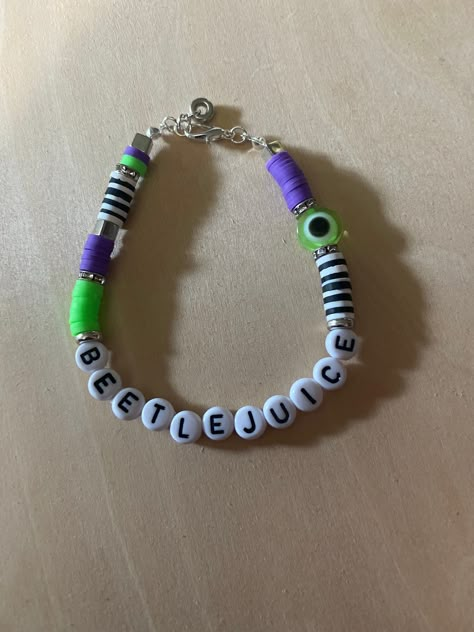 Handmade beetlejuice bracelet Beetle Juice Bracelets, Beetlejuice Bracelet Ideas, Beetlejuice Bracelet, Handmade Jewelry Display, Stitch Bracelet, Homemade Bracelets, Bracelet Inspo, Halloween Bracelet, Bracelets Design