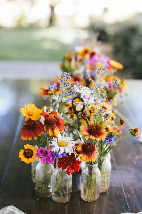 Diy Wedding Altar Ideas, Wildflower Centerpiece Wedding Simple, Texas Wildflower Wedding Theme, Wild Flower Wedding Boutonniere, Wild Flower Centerpieces Wedding Round Table, Wildflower Tablescape Round, Wild Flower Tablescape, Picnic Table Centerpieces Outdoor, Wildflower Arrangements Diy