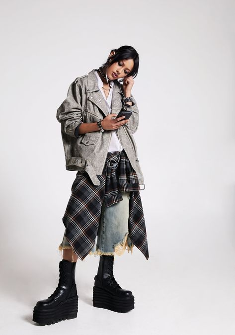 Rock through the grunge of life with this moto jacket that has an acid wash denim construction, a splattered beach design, distressed ripped detailing, a notch lapel collar,zippered front pockets, snap button pockets, long sleeves with zippered cuffs, an adjustable belted waistline, D-ring hardware, and a front zipper closure. Nonbinary Street Style, High Fashion Styling, Streetwear Fashion Edgy, Rock Poses Photography, Futuristic Streetwear Women, Korean Street Fashion Baggy, Upcycled Army Jacket, Rockfish Weather Wear, Punk Fashion Female