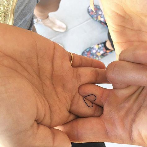 coupletattoos Couple Tattoo #jonboytattoo #tattoo #tattoos #inked #ink #black #heart #half #two #couple #friendship #coupletattoos #love #match #tattoosforcouples Heart Tattoo On Finger, Finger Tattoos For Couples, Small Finger Tattoos, Small Rose Tattoo, Tattoos For Women Half Sleeve, Bff Tattoos, Matching Couple Tattoos, Cute Small Tattoos, Cool Small Tattoos