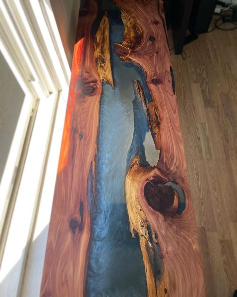 A customer of ours submitted this image to us. After purchasing two bookmatched red cedar slabs from us, he joined the two together with blue river epoxy. And boy, is it GORGEOUS! ----------------------------------------- Red Cedar, Epoxy Resin, Blue Epoxy, River Table, Live Edge, Custom Work, Woodworking Cedar Table, Epoxy River Table, Live Edge Bench, Table Live Edge, River Table, Wood Project, Blue River, Live Edge Wood, Beautiful Coffee