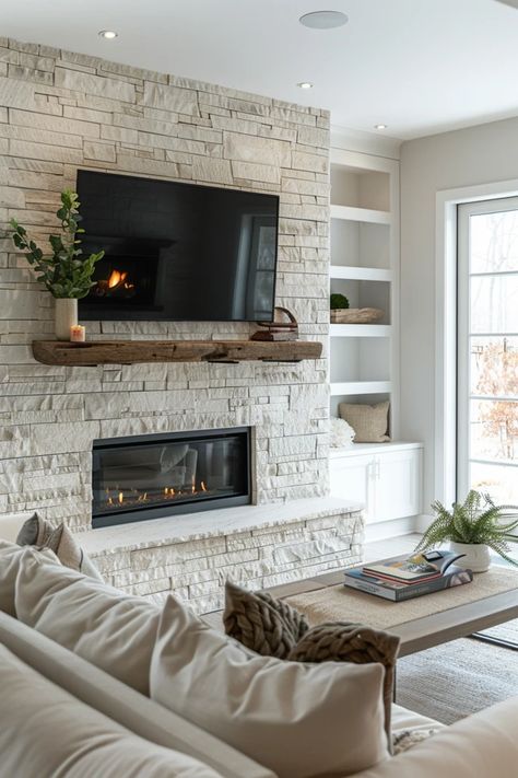 Discover the best techniques for securely mounting your TV to a stone fireplace with our step-by-step guide. Elevate your space safely and stylishly. Rock Wall With Tv And Fireplace, Family Room With Stone Fireplace, Tv Mount Above Fireplace, Stone Fireplace And Built Ins, Tv On Stone Fireplace, Stone Wall Fireplace With Tv, Tiles Fireplace Surround, Tv Mounted On The Wall In Living Room, Fireplace Stone Ideas