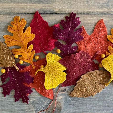 Lexie Just on Instagram: “Happy Autumn Equinox! 🍁🍂 This is by far my favorite season of the year. I just finished this fall leaf garland for my Mom to hang on her…” Leaf Hanging Wall Decor, Felt Fall Decor, Sewing Autumn Decoration, Autumn Leaf Garland Diy, Fall Leaf Garland Tree, Autumn Felt Garland, Felt Leaf Garland, Felt Autumn, Felt Leaf Garland Autumn