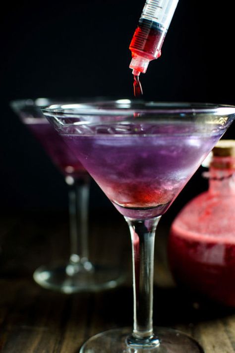 This drink will put a haunted spin on your happy hour. Inject some red grenadine with a syringe to take it to the next level.   Get the recipe at The Flavor Bender. Easy Halloween Cocktails, Flavoured Vodka, Halloween Drinks Alcohol, Witch's Heart, Heart Food, Halloween Cocktails, Halloween Drinks, Easy Cocktails, Witches Brew