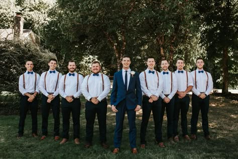 Navy suit and brown shoes. Groomsmen in white shirts, navy pants, royal bowties, brown shoes, brown suspenders, brown belt. Groomsmen Attire Navy Suspenders, Groomsmen Attire Navy Blue, Groomsmen In White, Wedding Suspenders Groomsmen, Rustic Groomsmen Attire, Navy Blue Groomsmen, Navy Groomsmen Suits, Brown Groomsmen, Blue Groomsmen Suits