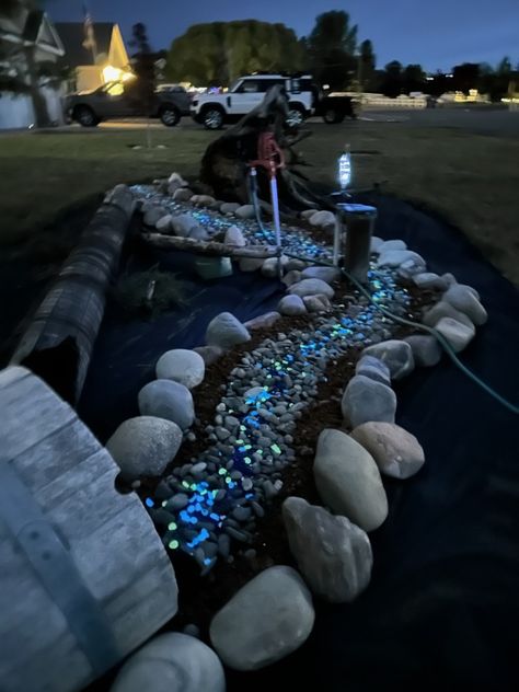 Blue glass rock and glow in the dark rocks Glow In The Dark Garden, Dry Riverbed Landscaping, Glow In The Dark Rocks, Landscape Island, Garden Pebbles, Glow Rock, Water Wise Landscaping, Dark Garden, Dark Landscape