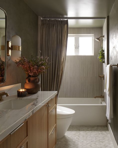 First up from the #SFMBOrganic Project is the Guest Bathroom. Our whole team is so in love with the romantic and moody vibe. Design: #EthanCharlesDesign Project: #SFMBOrganic Photography: @public311design #InteriorDesigner #InteriorDesign #LAInteriorDesigner #LosAngeles #DesignInspo #WoodlandHills #orangecounty Moody Primary Bathroom, Moody Burgundy Bathroom, Dark Bathroom Mood Board, Large Moody Bathroom, Moody Bathroom White Tile, Moody Guest Bathroom, Master Ensuite Bathroom Moody, Primary Bathroom, Woodland Hills