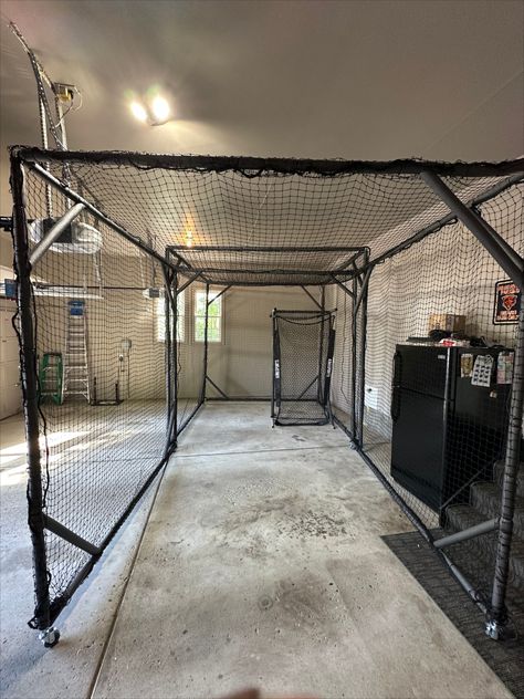 Check out Dino's build!

"The modular batting cage is done. I made it so that I can swivel it to the larger side of the garage and pull out the 2nd section. I also built a pitching screen protector for when I throw to my son. I used the 3/4 connectors, EMT conduit, and some pipe insulation with zip ties. I’m pretty happy with how it turned out. Check out the pics." Batting Cage In Basement, How To Build A Batting Cage, Garage Baseball Training, Batting Cages Indoor, Indoor Batting Cage Garage, Diy Indoor Batting Cage, Basement Baseball Training, Basement Batting Cage, Home Batting Cage Ideas