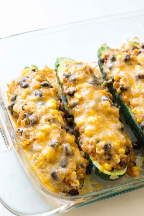 Quinoa-Black-Bean-Enchilada-Stuffed-Zucchinis-gluten-free-1-683x1024-1 Stuffed Zucchini Boats Vegetarian, Zucchini Boats Vegetarian, Fresh Corn Recipes, Zucchini Boat Recipes, Stuffed Zucchini Boats, Black Bean Enchiladas, Easy Quinoa, Black Bean Quinoa, Bean Enchiladas