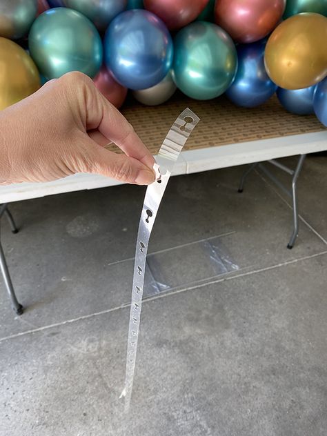 Easiest Ever DIY Balloon Garland – Less Than Perfect Life of Bliss Balloon Garland On Pop Up Tent, Balloon Strip Garland, Balloon Garland On Fence, How To Use Balloon Tape Strip, Ballon Backdrop Simple, Balloon Garland On Backdrop Stand, Straight Balloon Garland, Diy Balloon Weights Cheap, Alternative To Balloon Arch