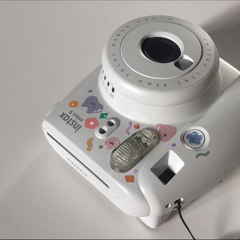 Instax polaroid with aesthetic cute stickers. Instagram aesthetic white filler picture. White Instax Camera Aesthetic, Polaroid Camera With Stickers, Decorating Polaroid Camera, Polaroid Camera Decoration, Instax Liplay Aesthetic, Instax Printer Aesthetic, Camera With Stickers Aesthetic, Aesthetic Instax Camera, Instax Mini 9 Aesthetic